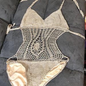 Crochet one piece bathing suit.